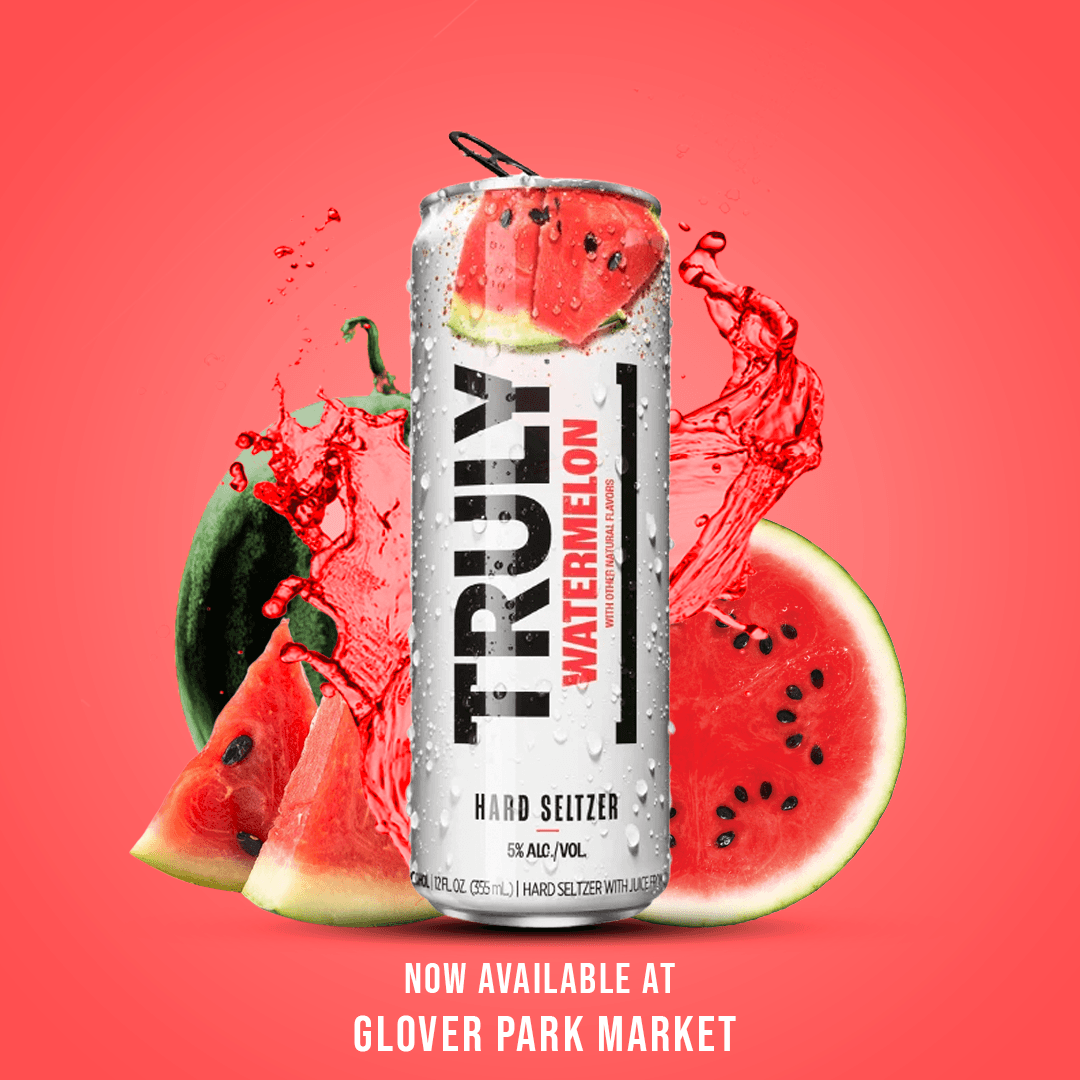A promotional graphic for Truly Watermelon hard seltzer, showing the can surrounded by fresh watermelon and splashes of juice.